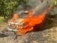 100524-Požár osobního automobilu na okraji lesa mezi obcemi Vavřineč a Liblice na Mělnicku.jpg